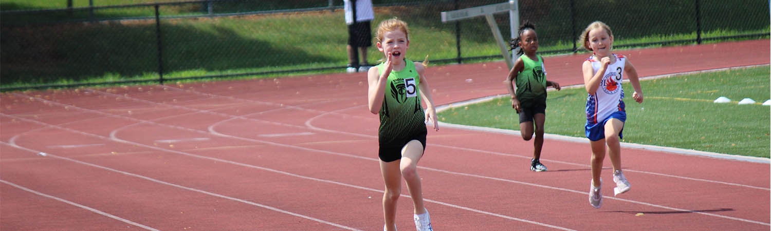 TTC youth athlete sprinting to the finish